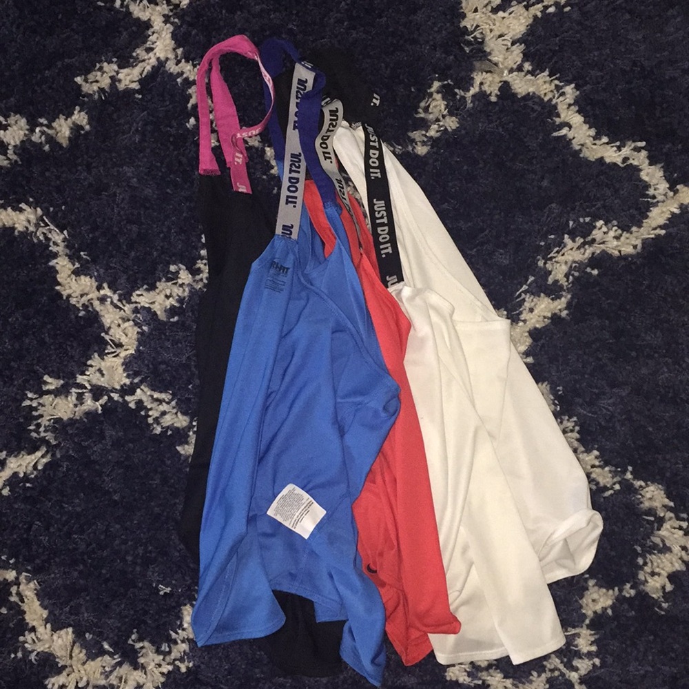 Nike workout tanks size large all four included!!